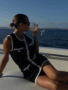 Leah - Sleeveless Mini Dress Olivia The Label